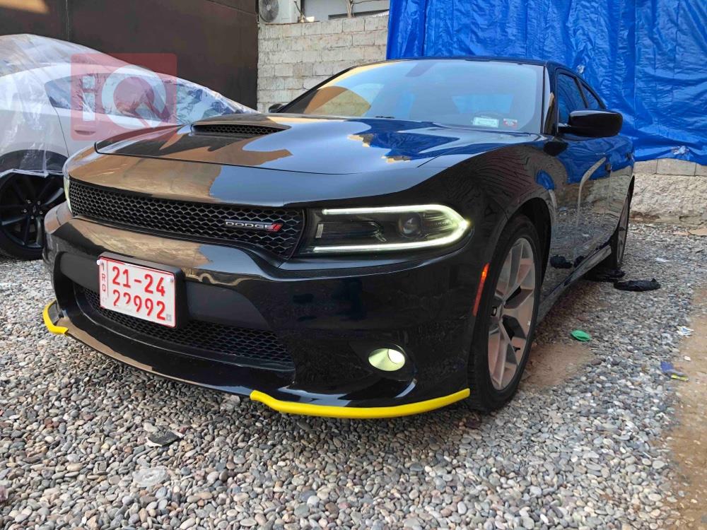 دۆج چارجەر